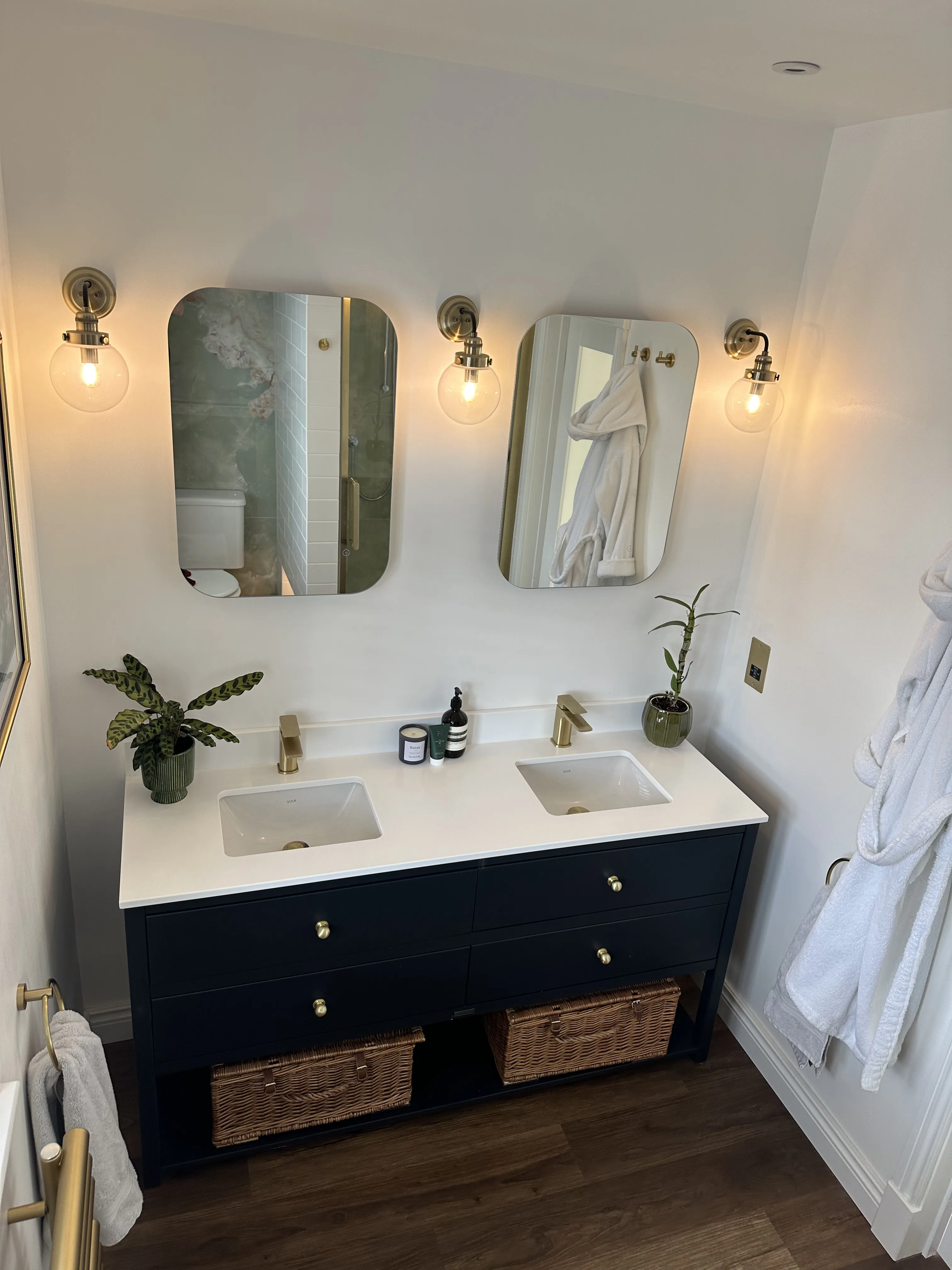 Walk-in shower enclosure with tiled finish