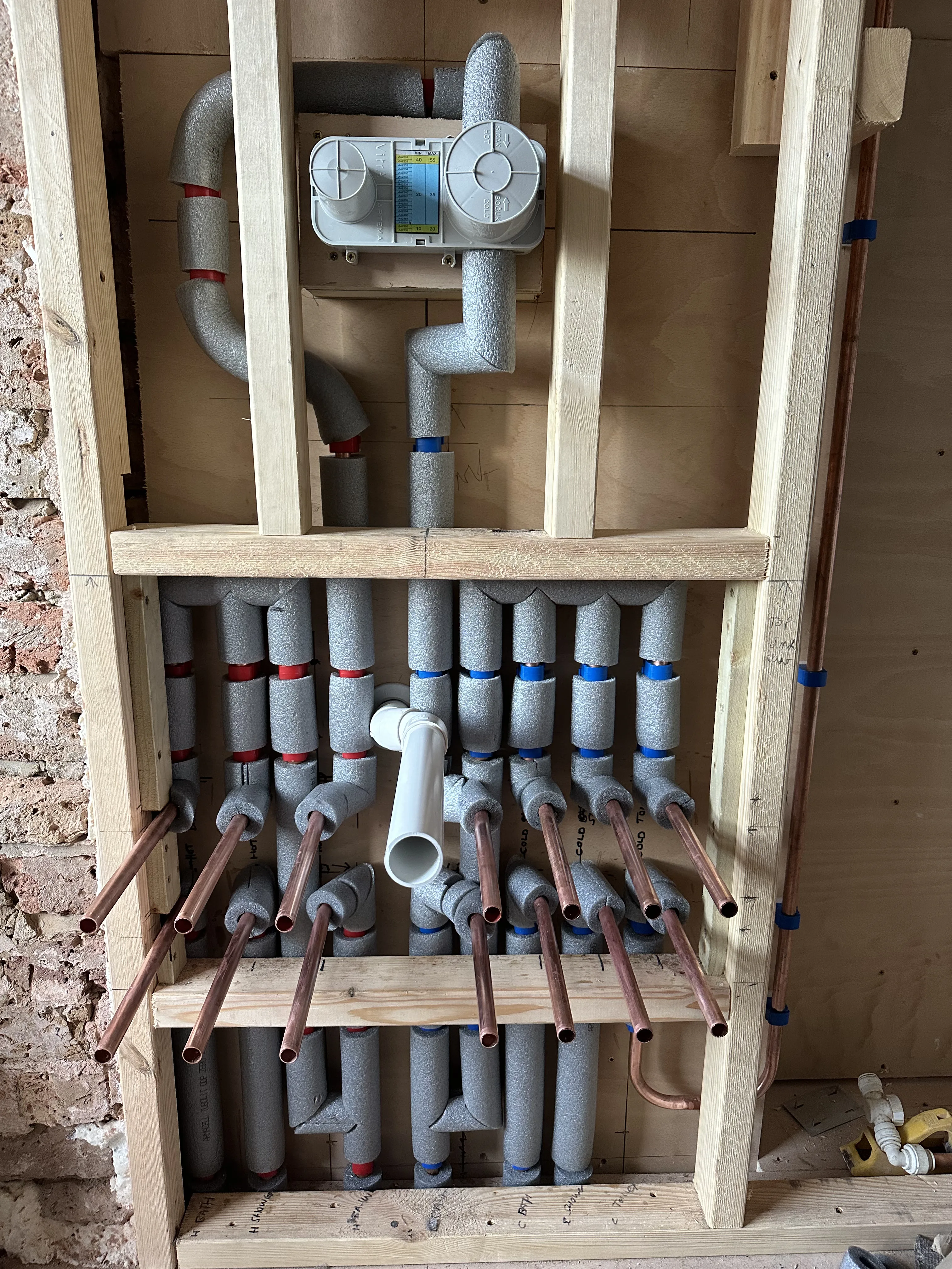 Bathroom underfloor heating installed before tiling